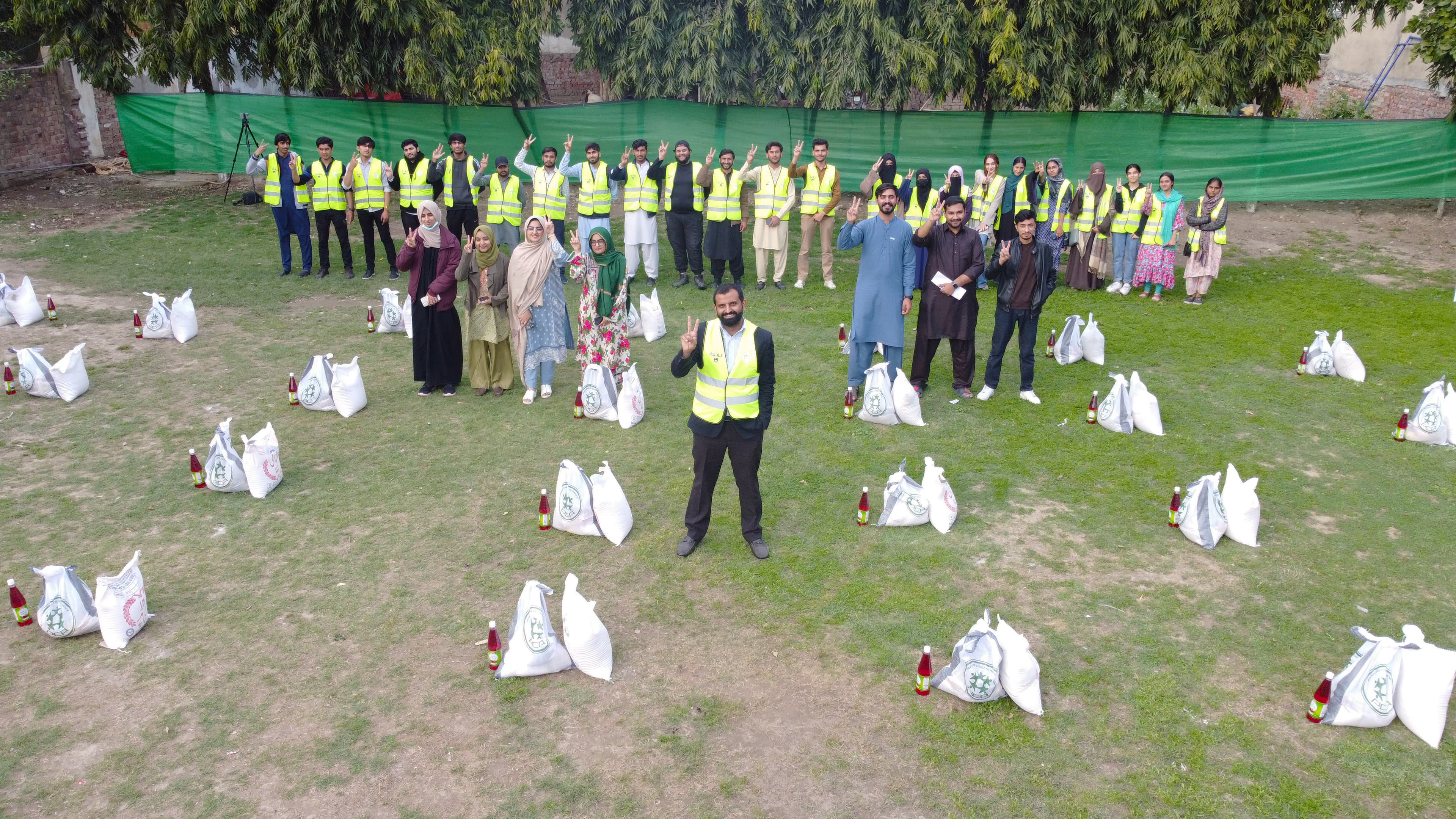 Happy and motivated volunteers before the Ramazan ration packages distribution in Lahore.